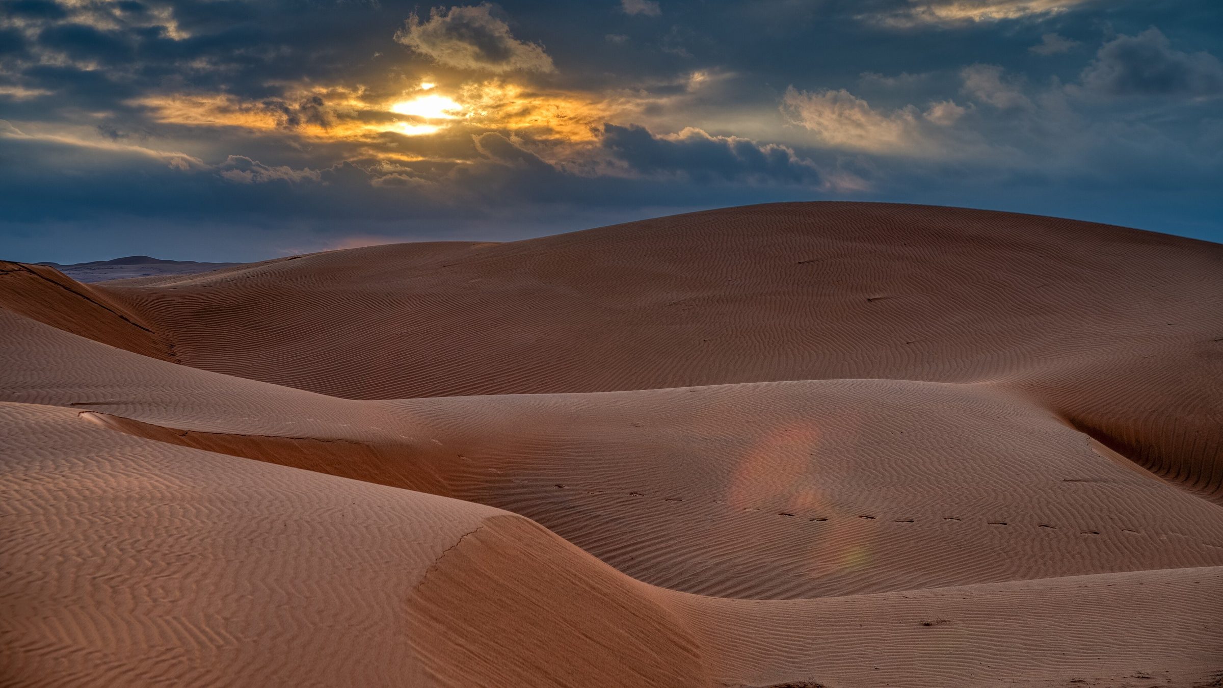 Sonnenuntergang über den Dünen der Wahiba Sands im Oman